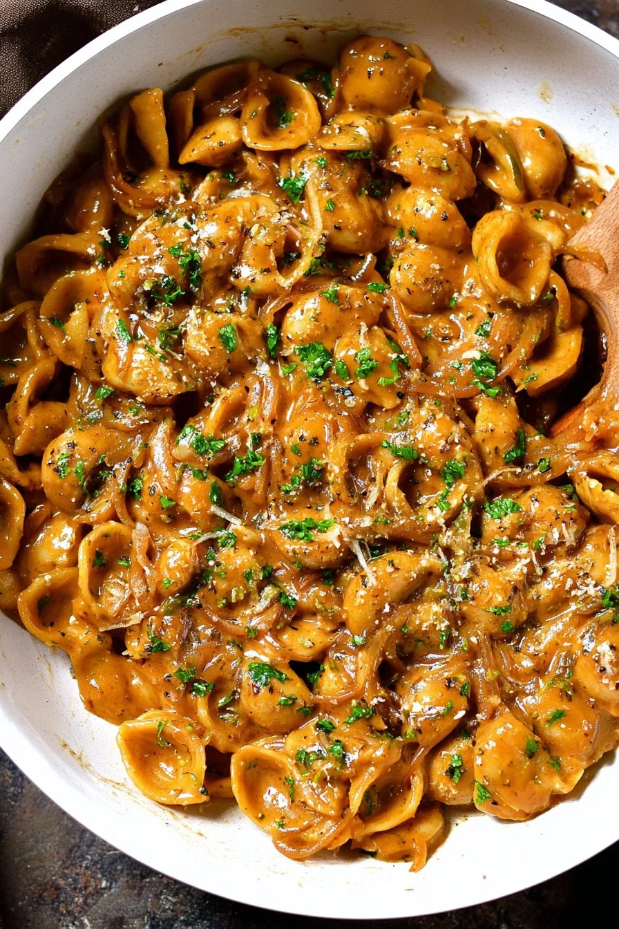 French Onion Pasta topped with Gruyère and herbs